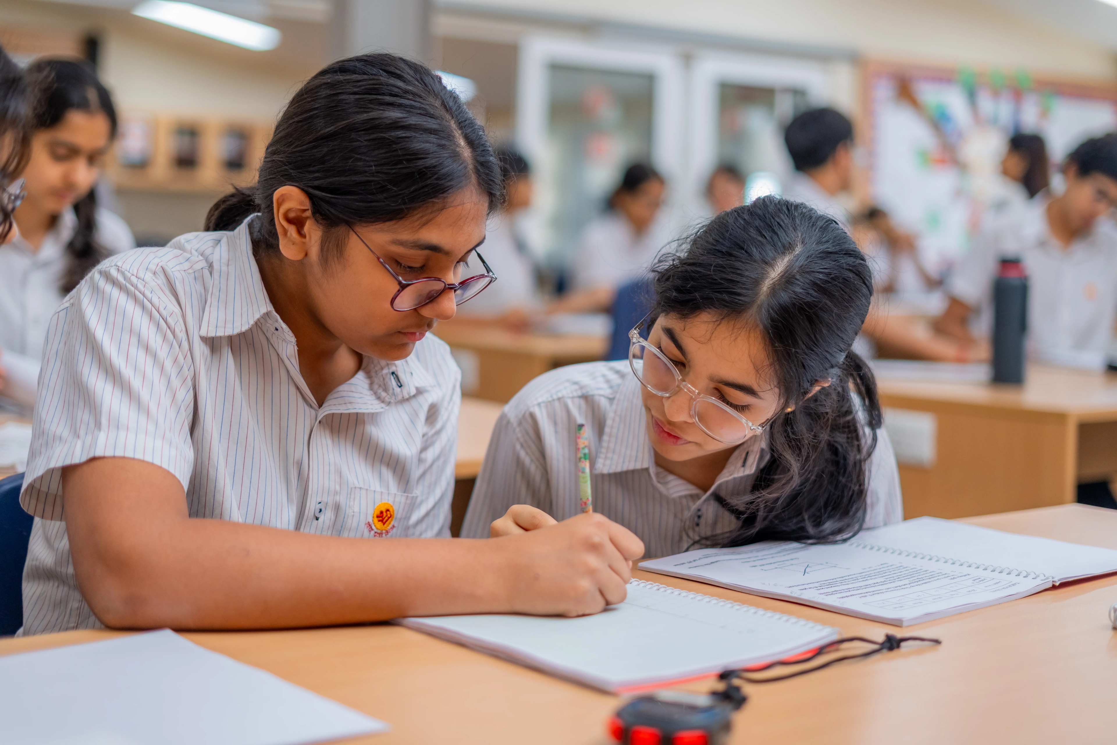 Secondary School students at an event in the TSRS auditorium