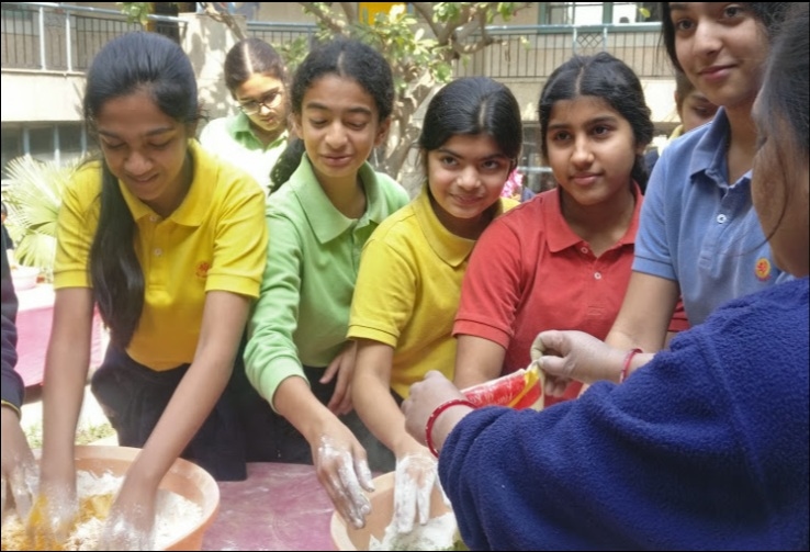 Natural Holi colours made from flowers and turmeric at The Shri Ram School