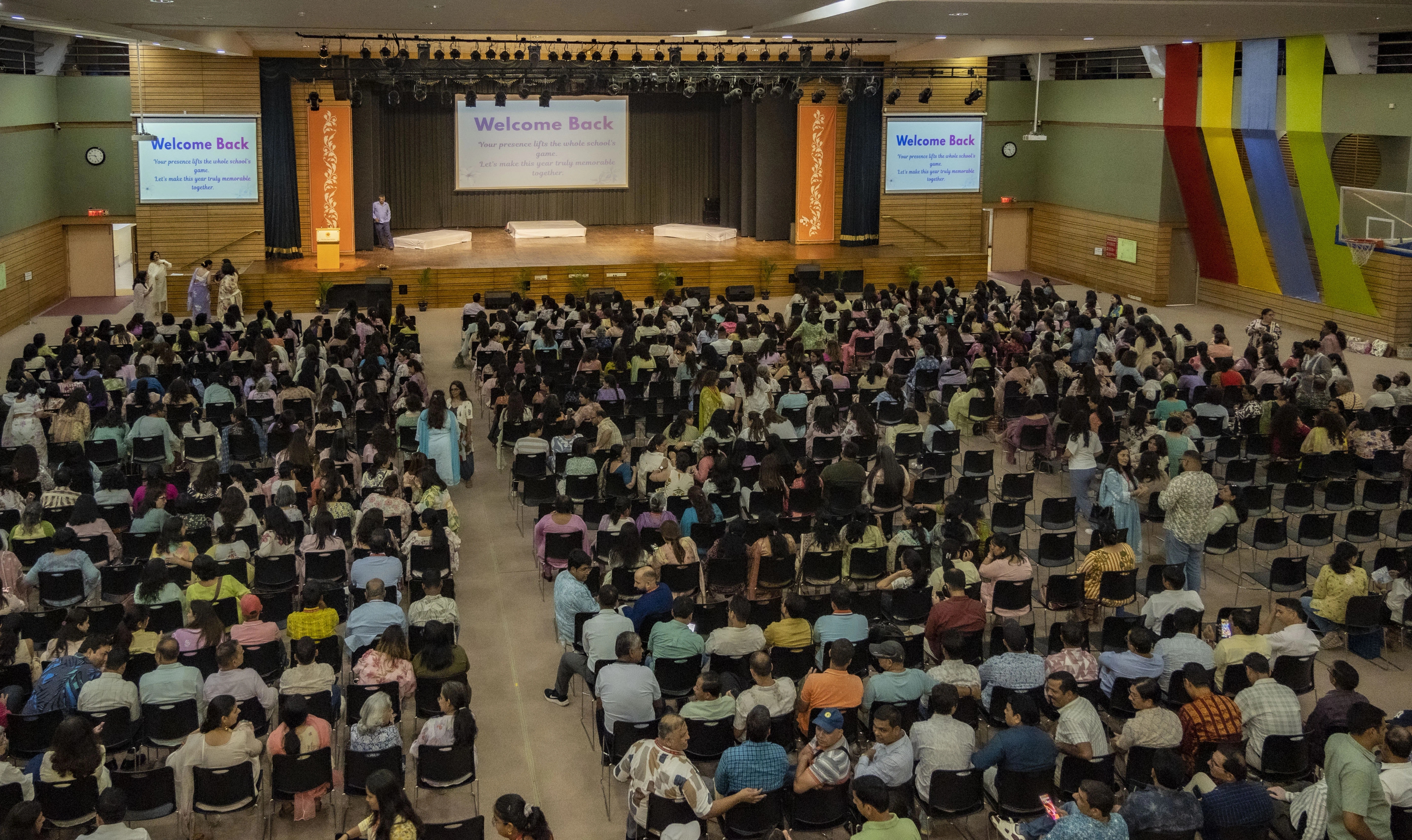 TSRS students raising their hands in a classroom