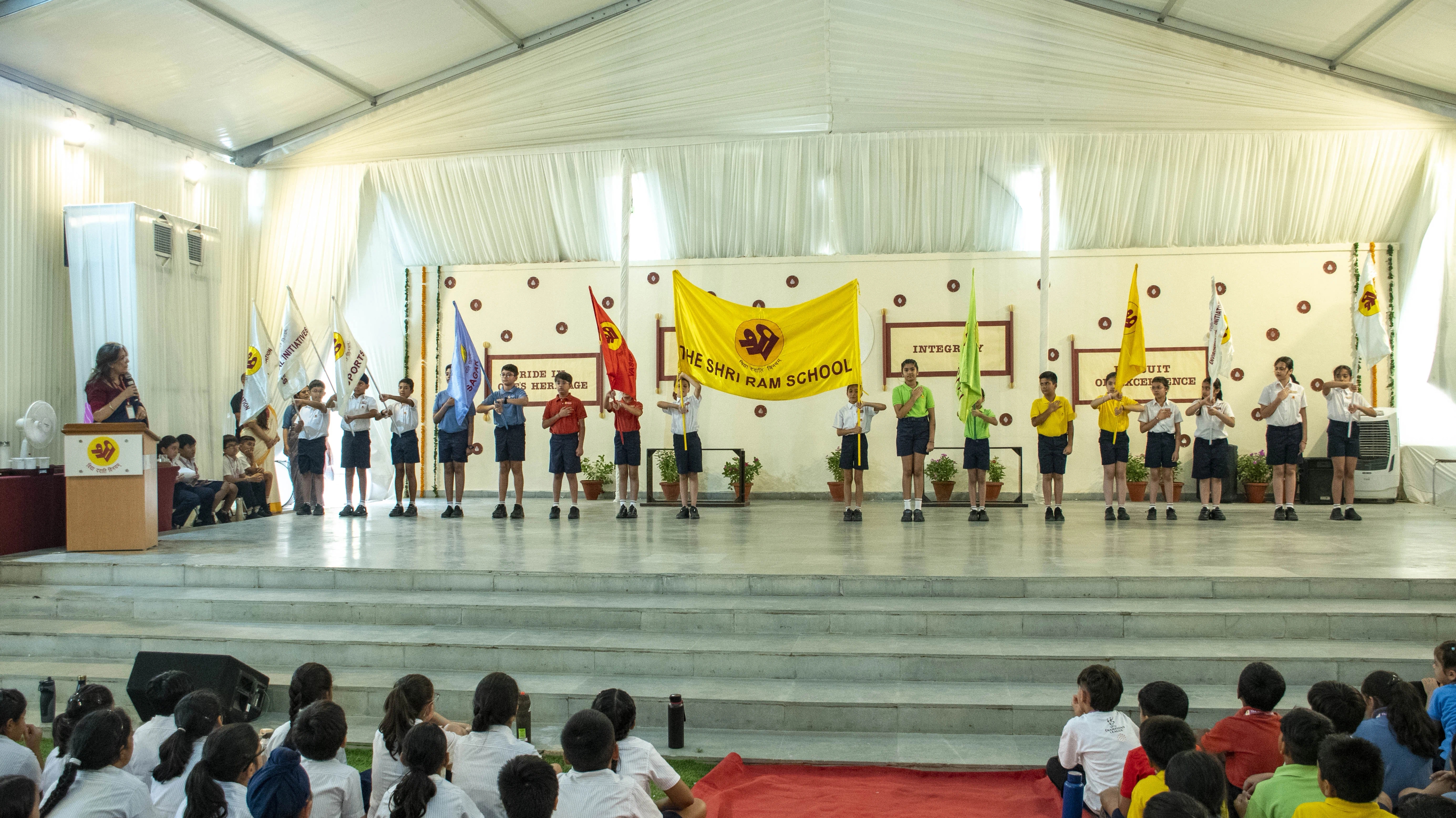 Students and a teacher in a classroom discussion at The Shri Ram School
